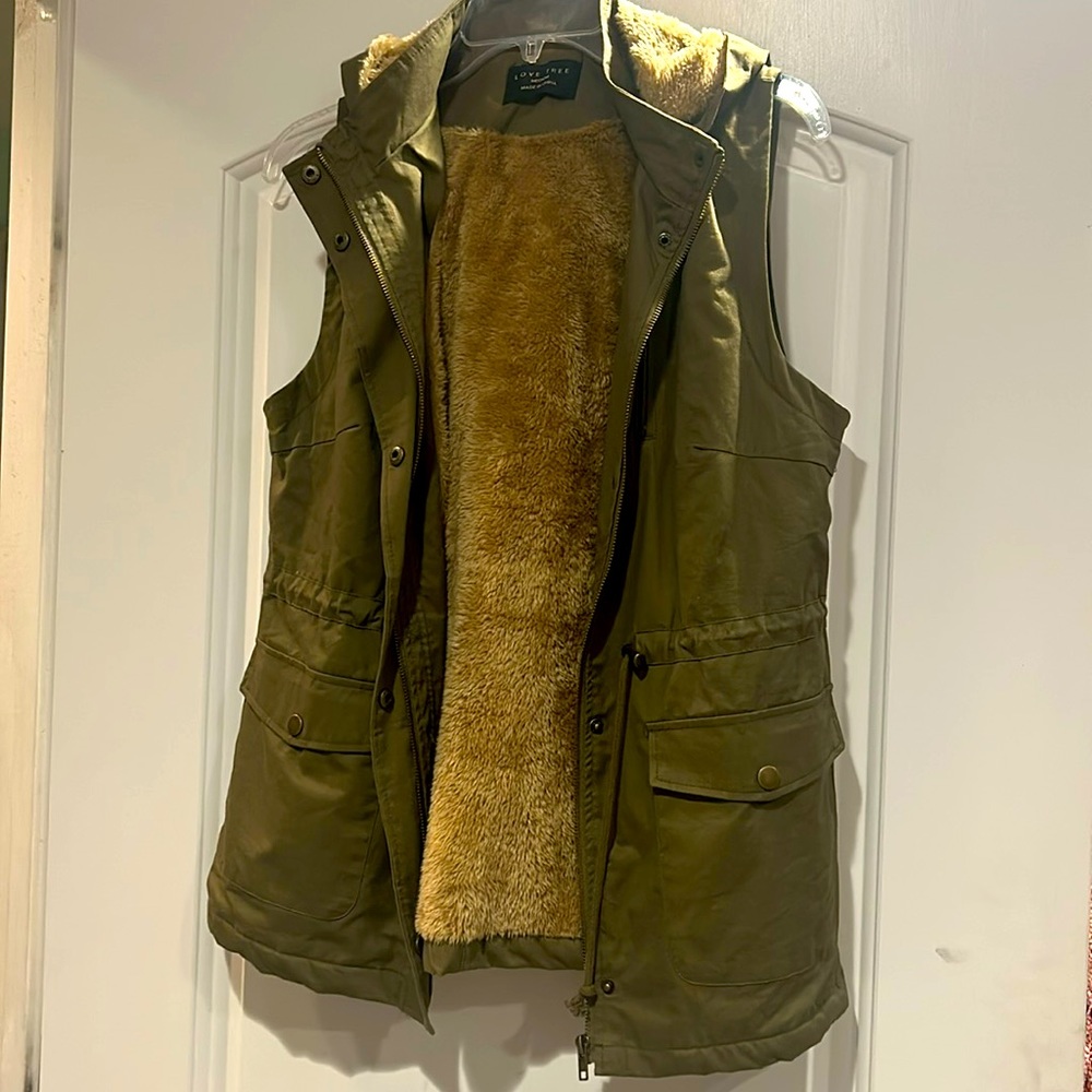 Olive green vest. Size small. Worn once.